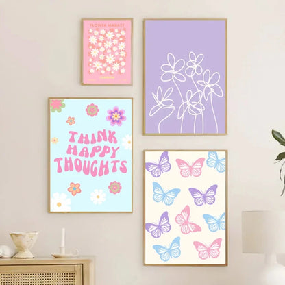Set of four colorful framed prints on a wall, featuring floral and butterfly designs.