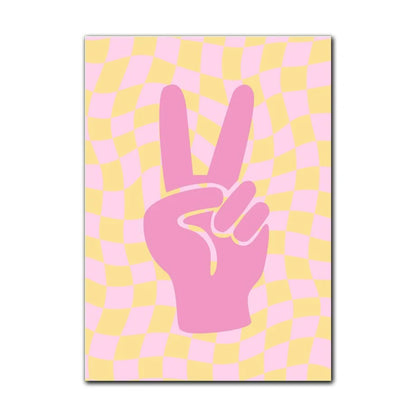 Pink hand making a peace sign on a yellow and pink checkered background