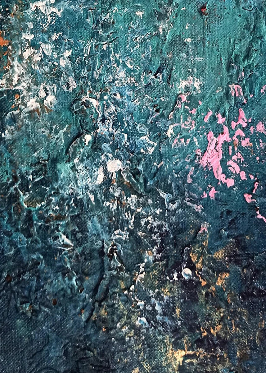 Close-up of textured surface with blue, pink, and orange colors