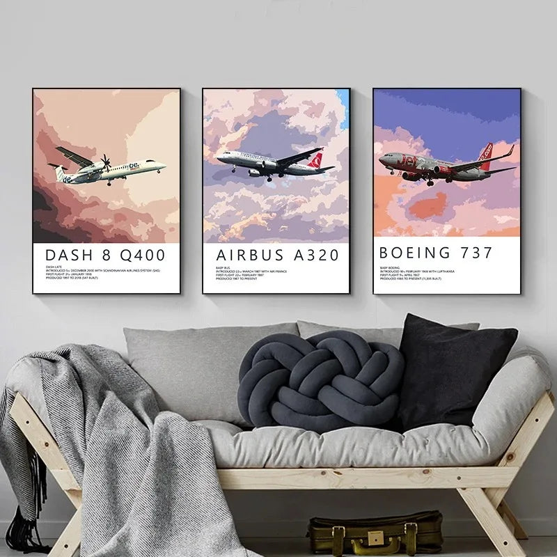 Three airplane posters on a wall above a sofa with decorative pillows.