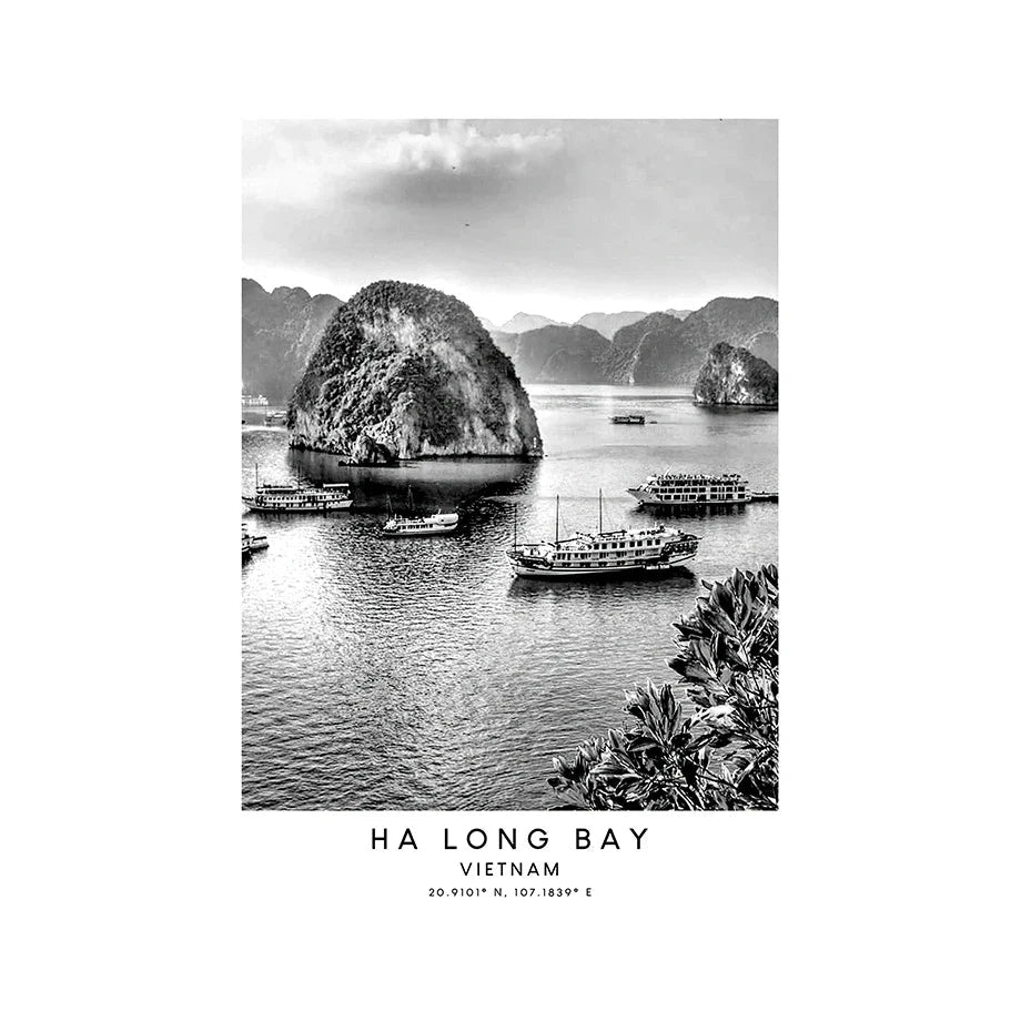 Black and white photo of Ha Long Bay with boats and islands.