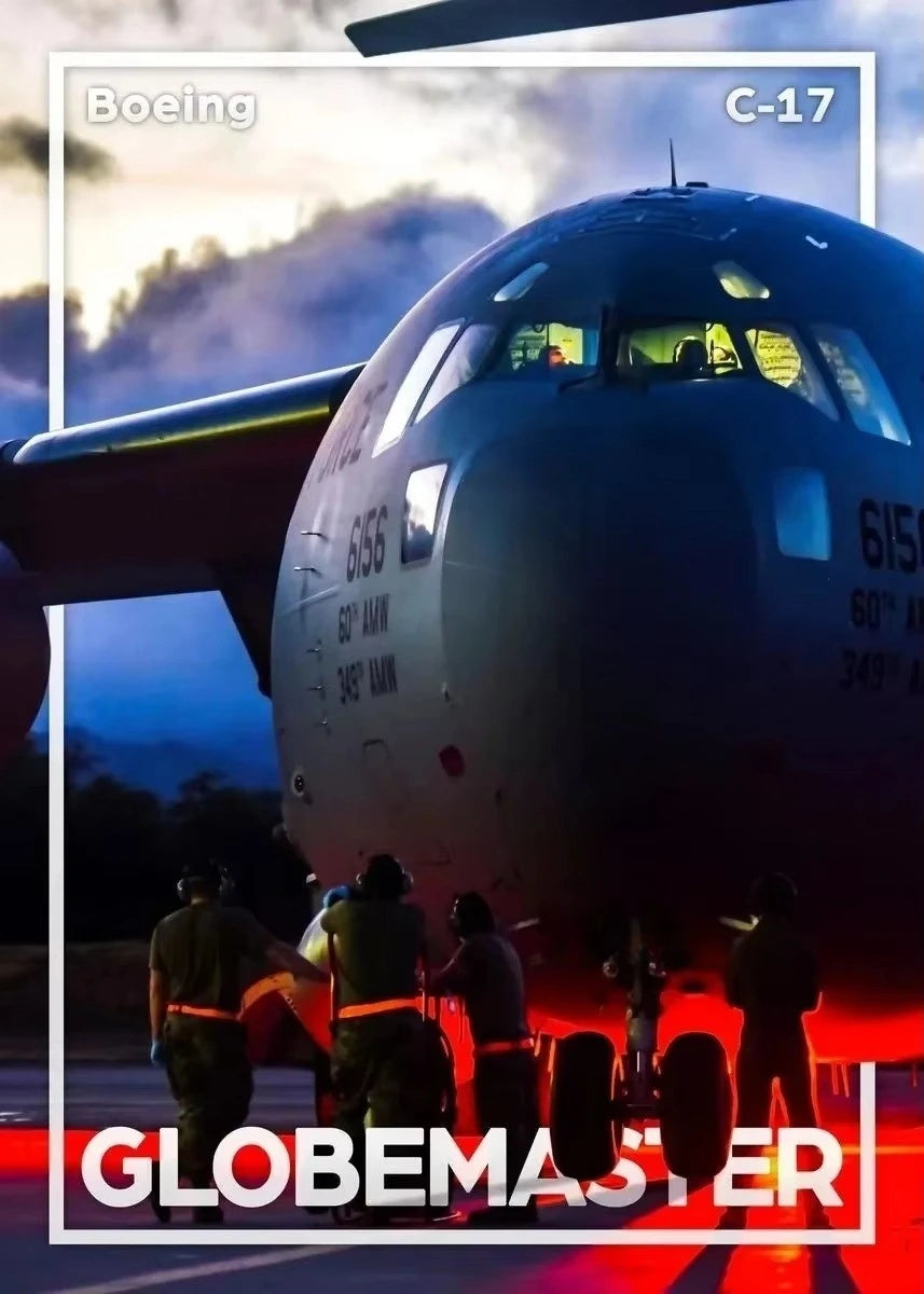 Boeing C-17 Globemaster aircraft with people around it on a runway.