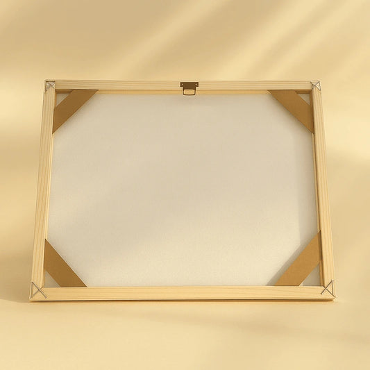 Wooden picture frame on a beige background Canvas & Curio
