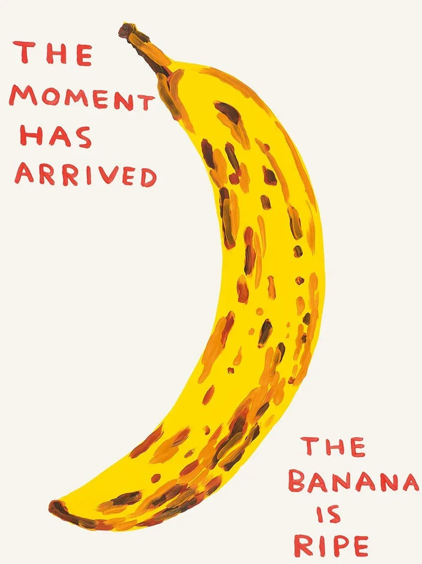 Ripe banana with text 'The moment has arrived. The banana is ripe.' on a white background