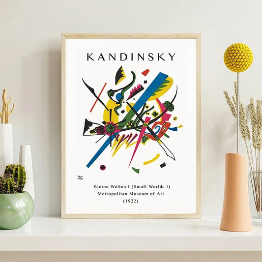 Framed Kandinsky artwork on a shelf with decorative items Canvas & Curio