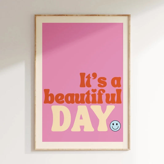Framed poster with 'It's a beautiful DAY' text on a pink background Canvas & Curio