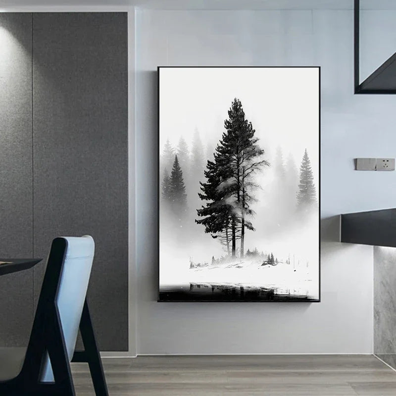 Framed black and white nature print of a tree on a wall in a modern interior setting.
