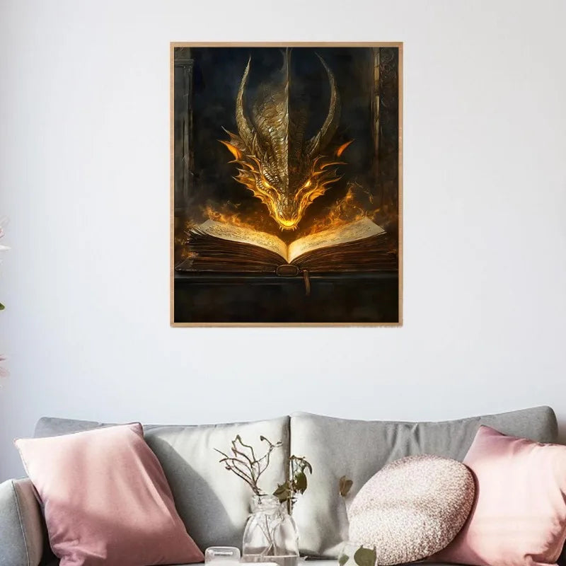 Framed artwork of a dragon emerging from an open book above a sofa with decorative pillows.