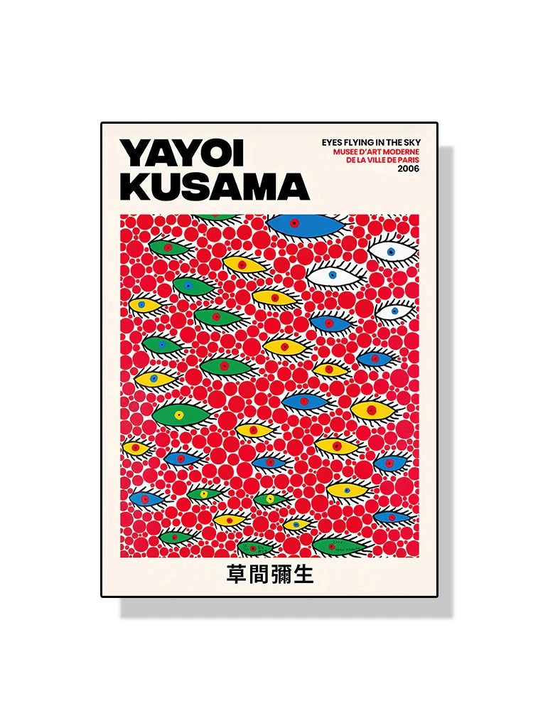 Book cover with colorful eye pattern and 'Yayoi Kusama' text on a red background