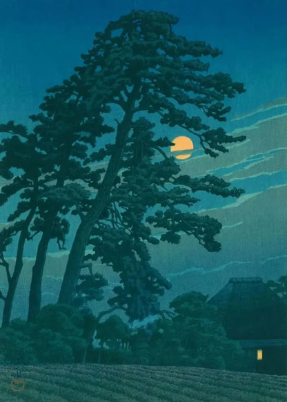 Silhouette of a large tree with a moonlit sky and traditional building in the background