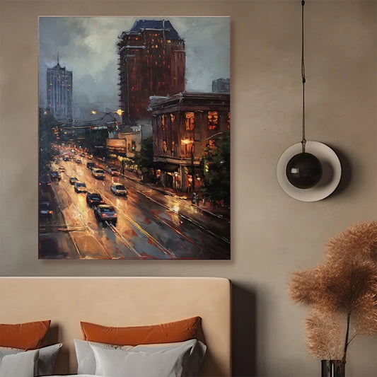 Cityscape painting on a wall above a bed with orange and white pillows. Canvas & Curio