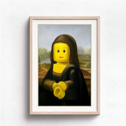 Framed artwork of a Mona Lisa with a Lego head on a white wall