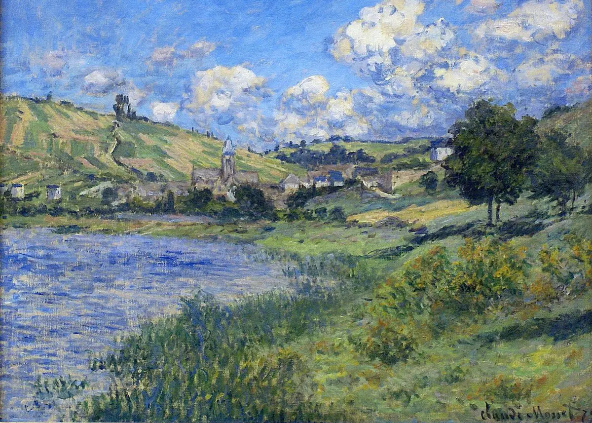 Landscape painting of a village by a lake with a blue sky and white clouds.