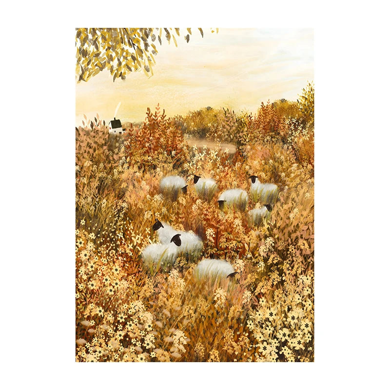 Sheep in a field with autumn colors and a sunset sky