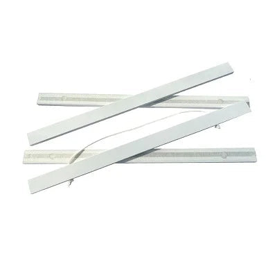Set of white metal strips on a white background