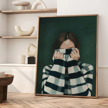 Framed artwork of a person in a checkered sweater in a room with shelves and decor.