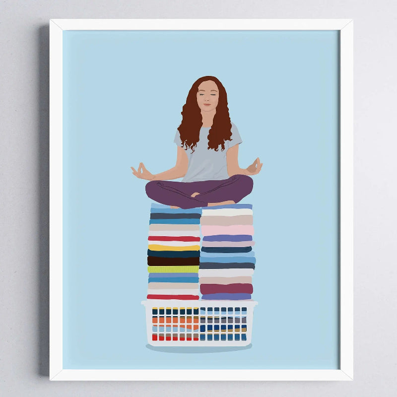 Illustration of a woman meditating on a stack of folded clothes inside a laundry basket against a light blue background.