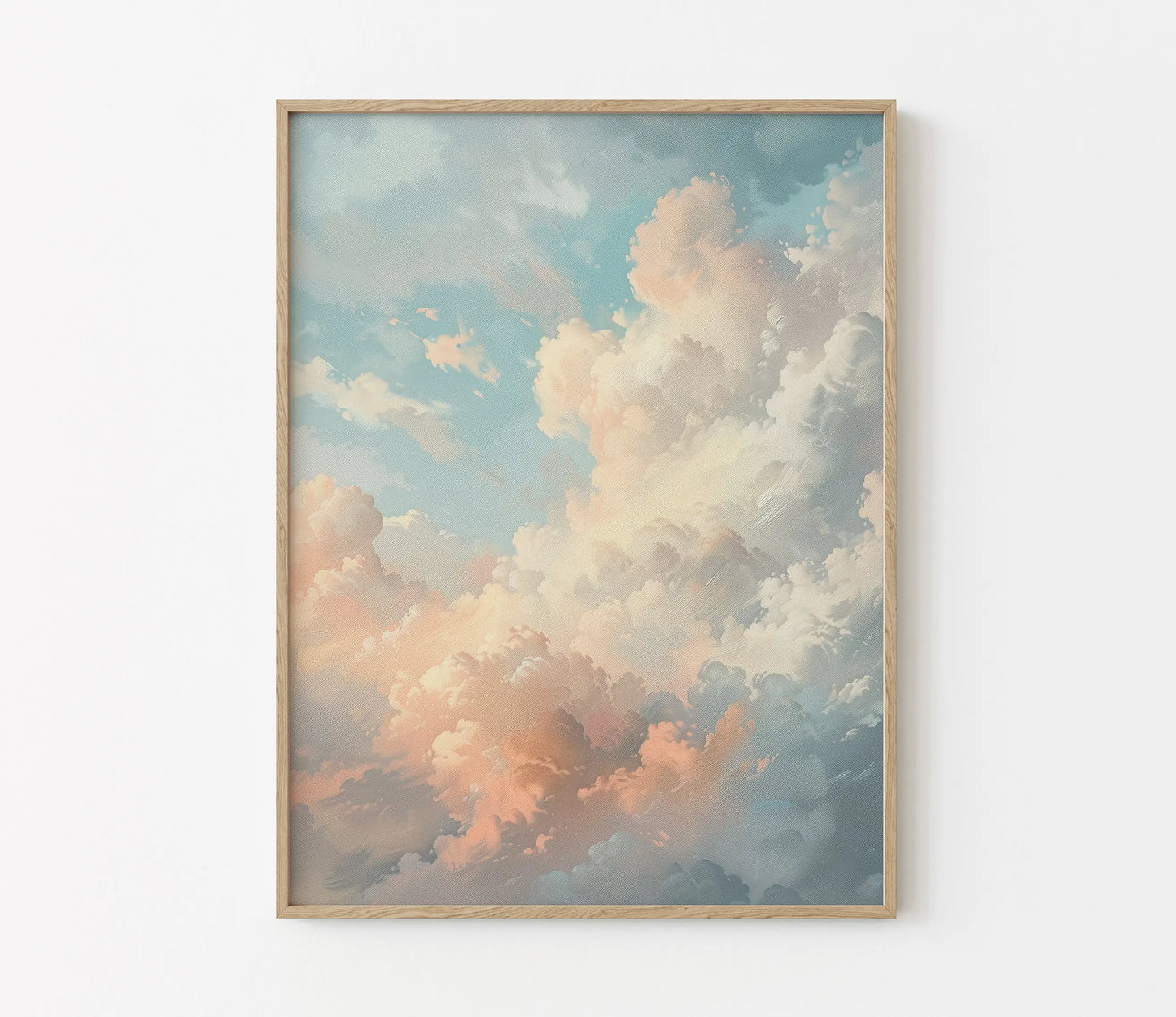 Framed artwork of a cloud scene on a white wall