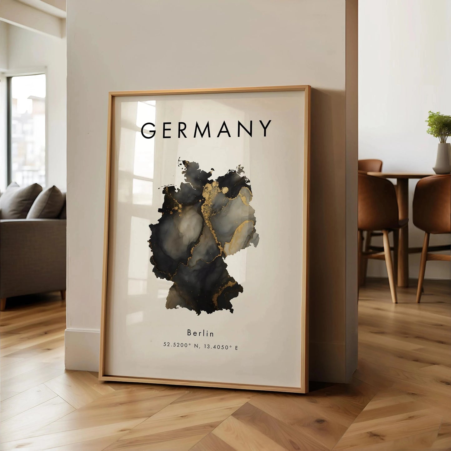 Framed map of Germany in a modern living room setting