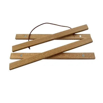 Three wooden stakes with a string on a white background