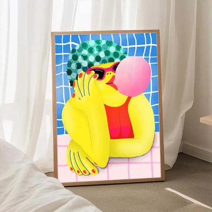 Framed artwork of a colorful character blowing a bubble with gum against a blue grid background.