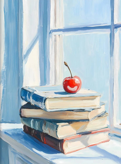 Stack of books with a red apple on top in front of a window
