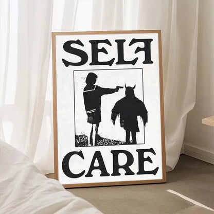 Framed artwork with silhouette of a person and horse, and text 'Self Care' on a white background.