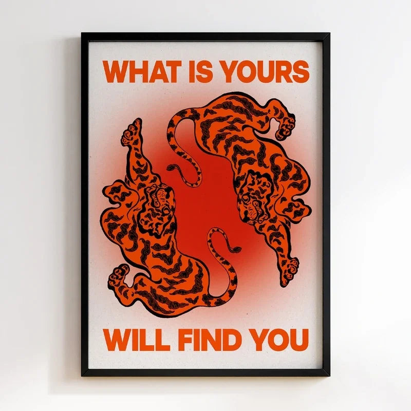 Framed artwork with two leaping tigers and motivational text on a gradient background