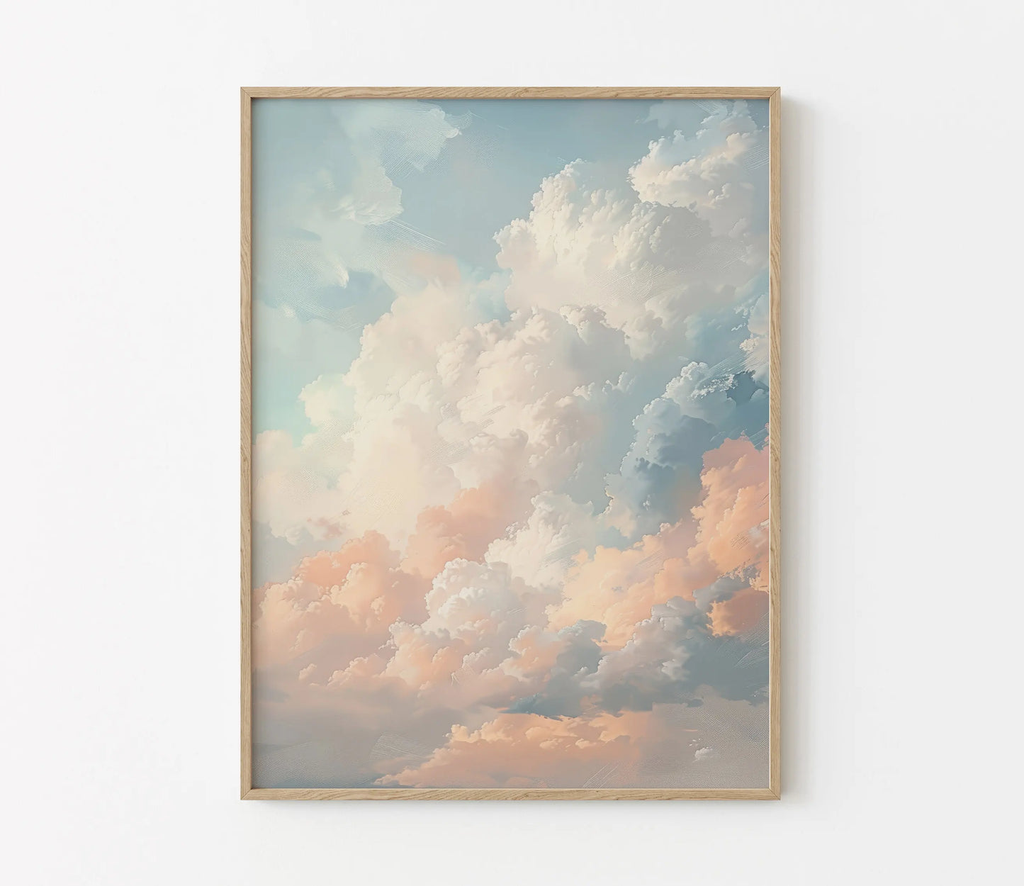 Framed artwork of a cloud scene on a white wall