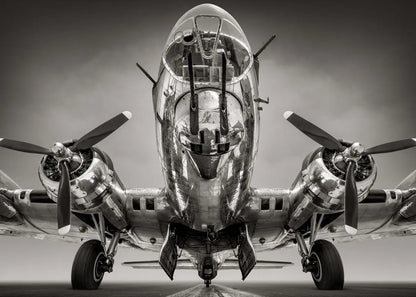 Vintage airplane with propellers on a runway