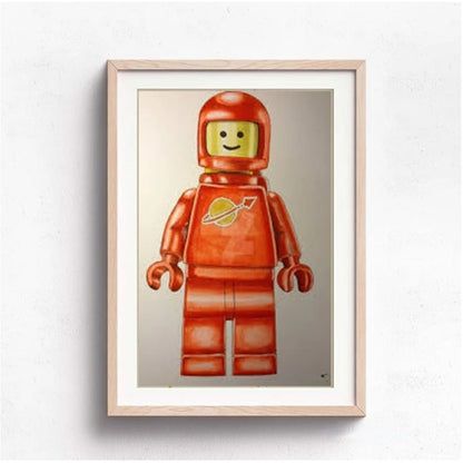 Framed artwork of a red astronaut figure on a white background
