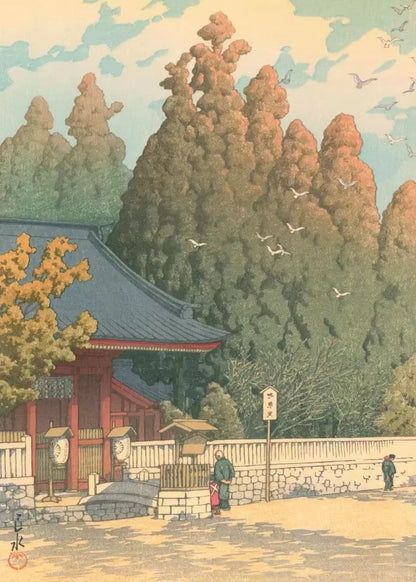 Traditional Japanese temple with trees and people in a serene setting