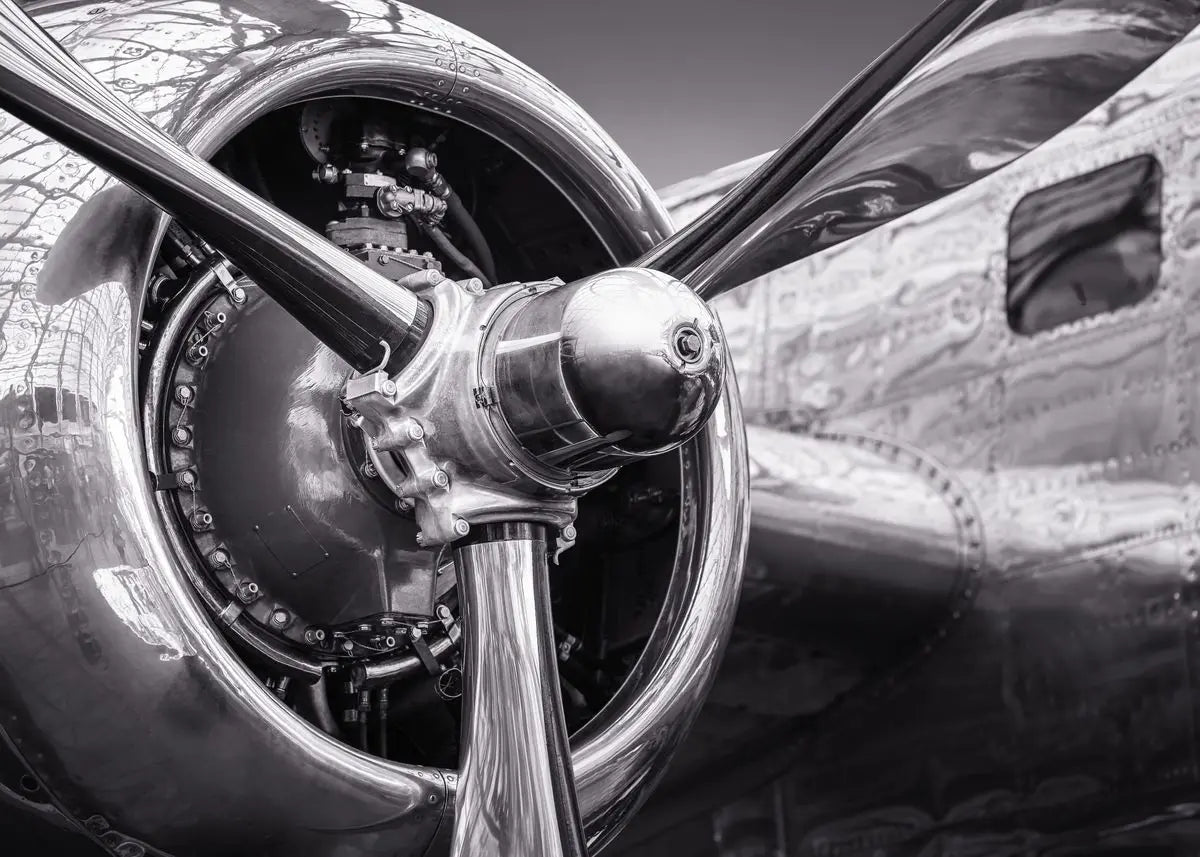 Close-up of a vintage airplane propeller and engine