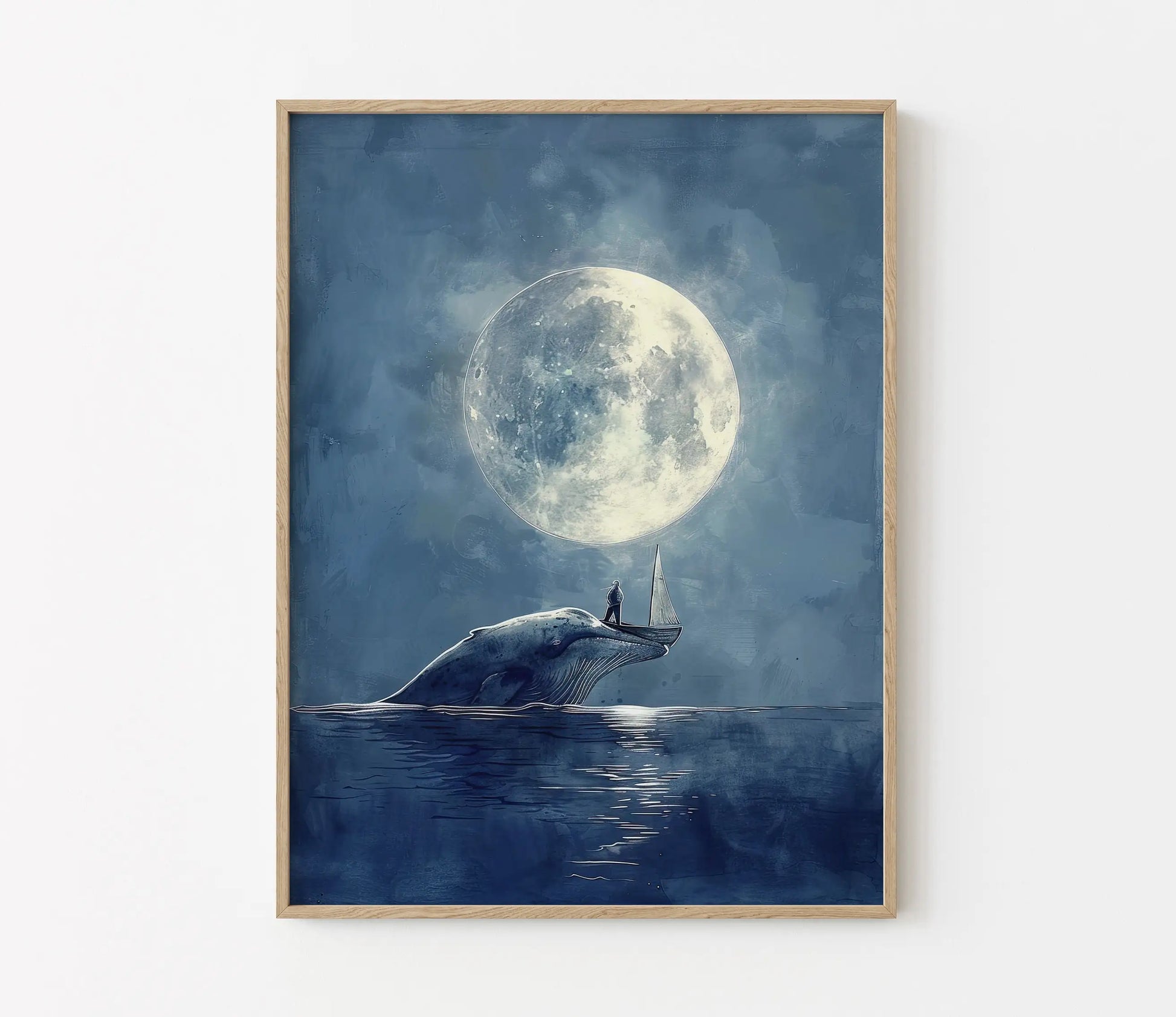 Framed artwork of a whale and person on a surfboard under a large moon.