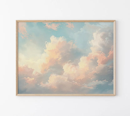 Framed artwork of a pastel sky with clouds on a white wall