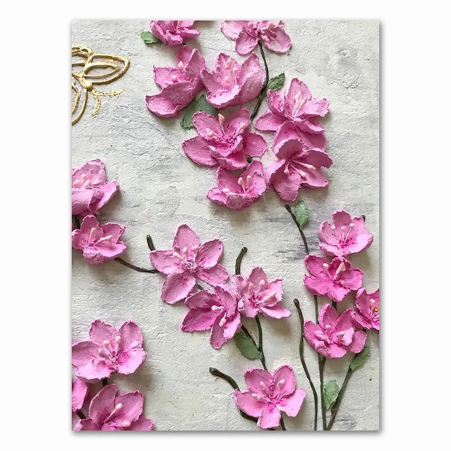 Card with pink floral design on a textured beige background
