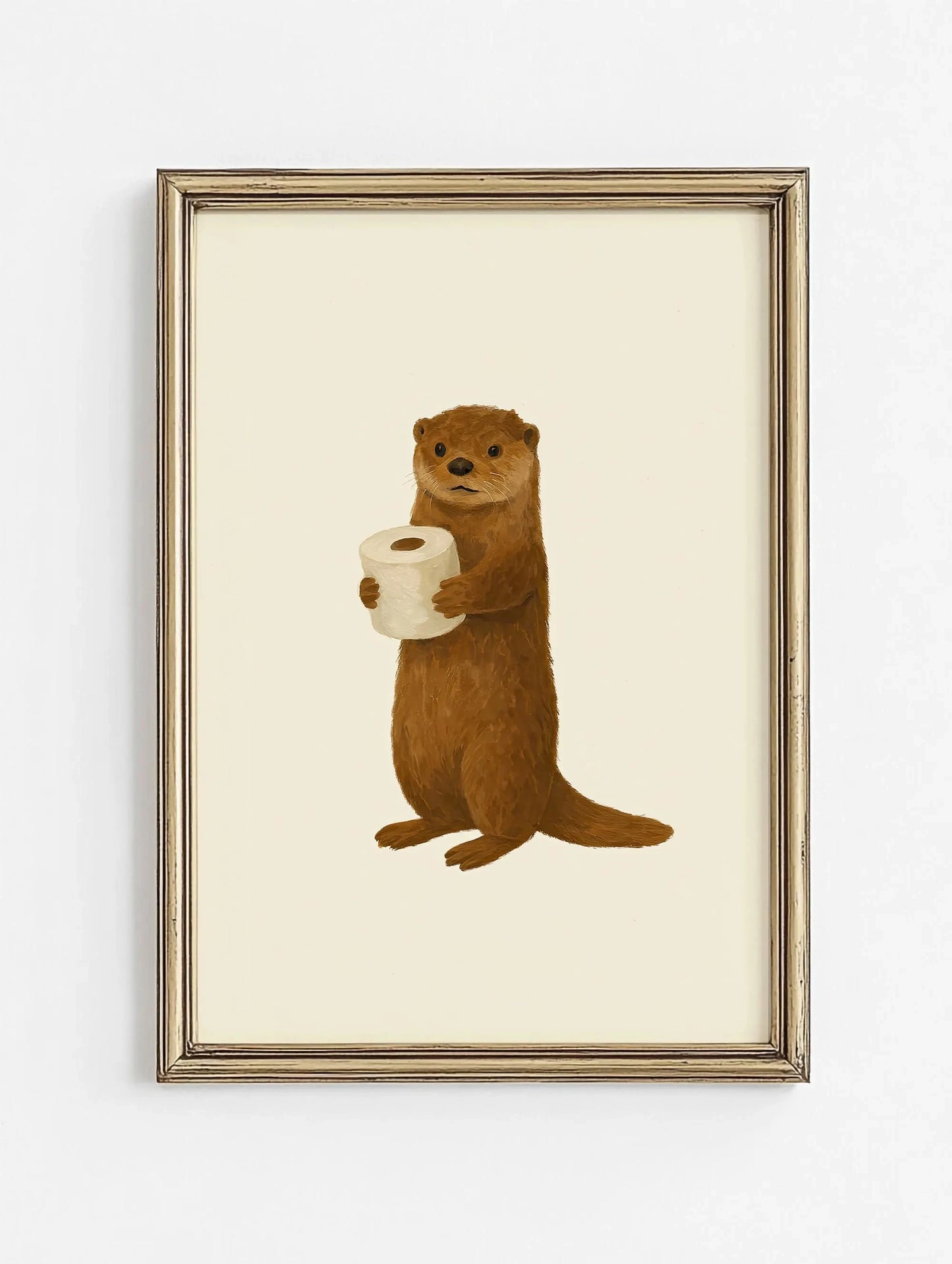 Framed artwork of an otter holding a roll of toilet paper on a beige background