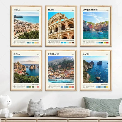 Set of framed prints depicting famous locations like Sicily, Rome, Cinque Terre, Positano, and Capri on a wall.