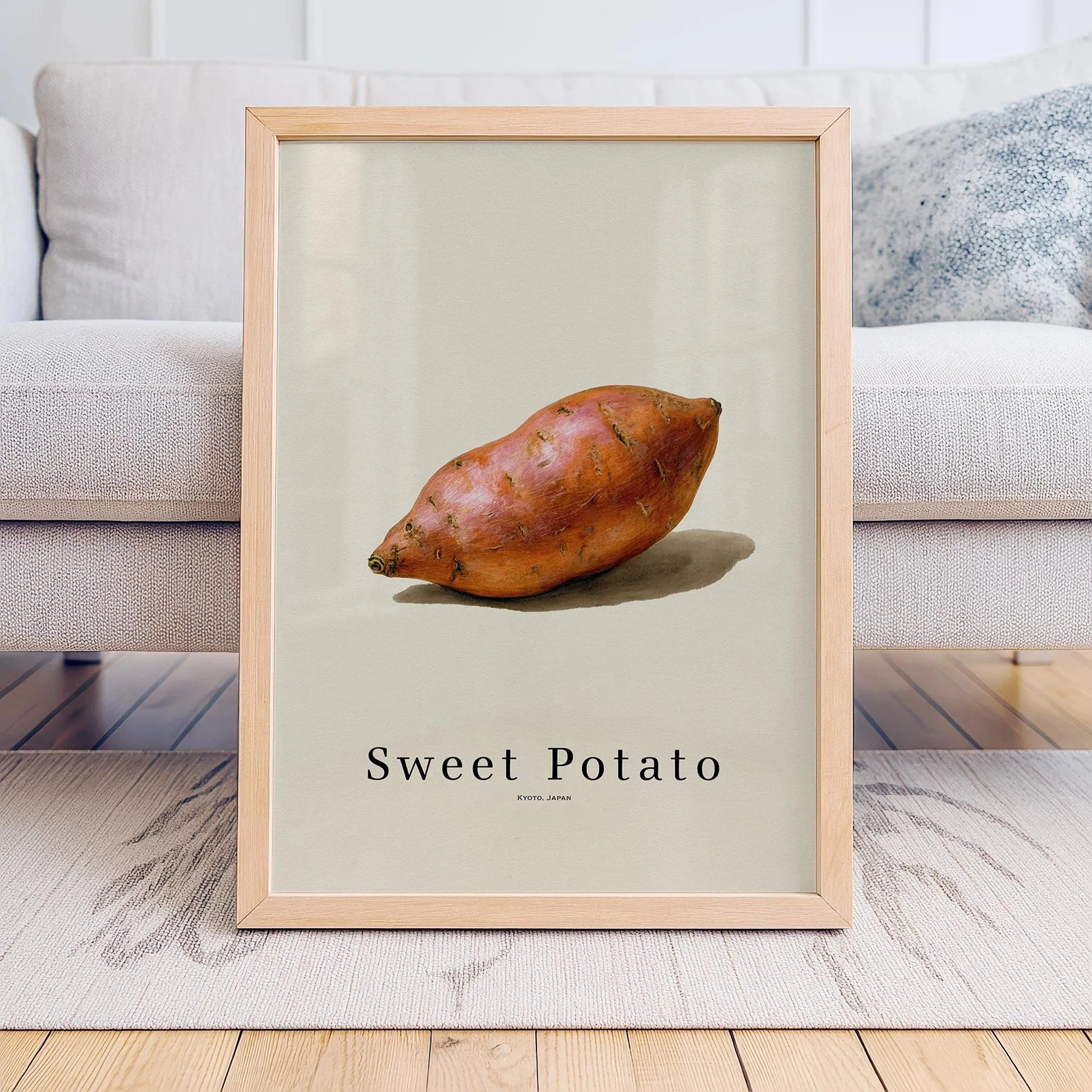 Framed print of a sweet potato on a neutral background