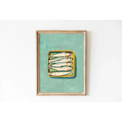 Framed artwork of a yellow tray with fish on a teal background