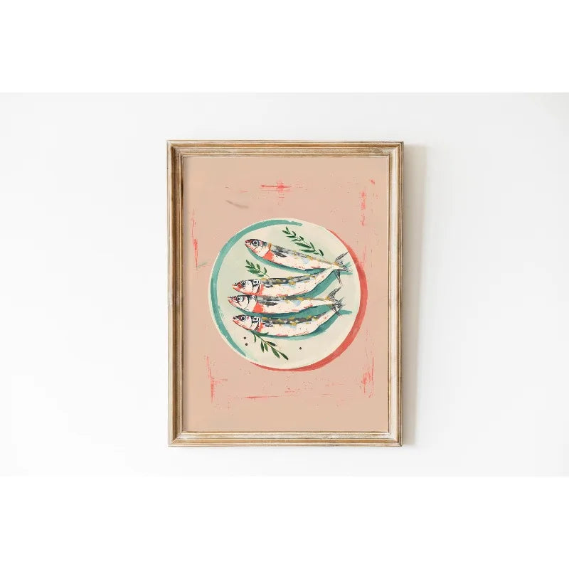 Framed artwork of fish on a white wall