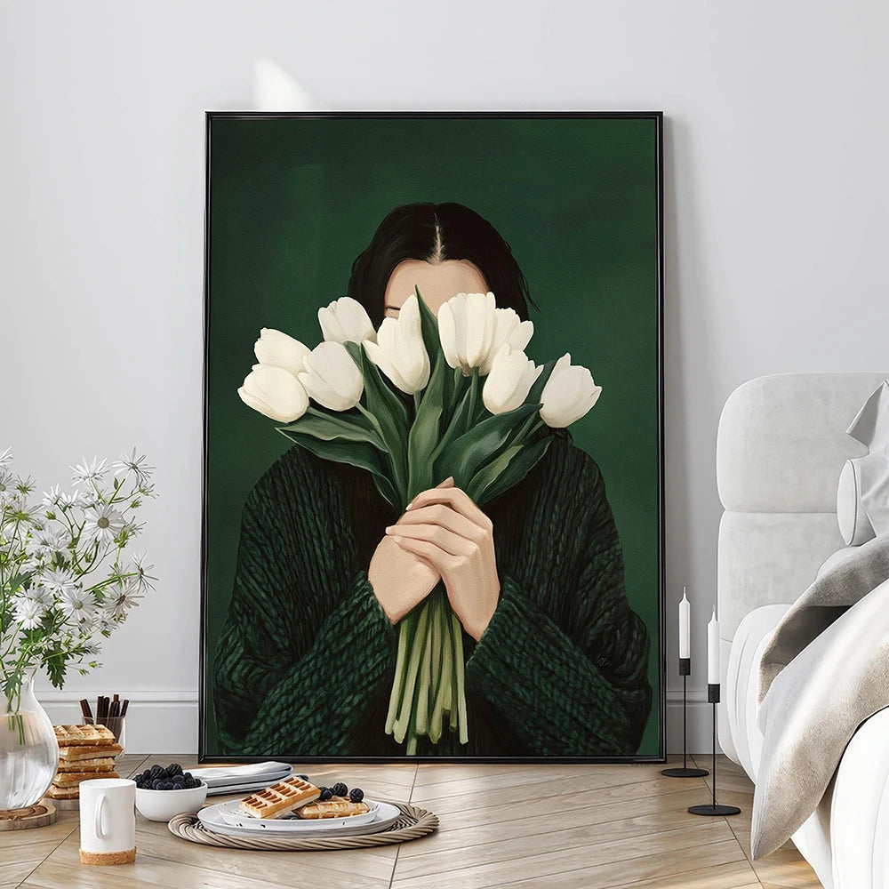 Framed artwork of a person holding white tulips in a modern living room.
