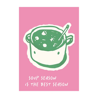 Green illustration of a soup pot with a spoon on a pink background with text 'Soup Season is the Best Season'.