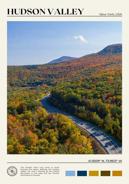 Scenic view of the Hudson Valley with a road winding through colorful autumn trees.