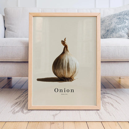 Framed artwork of an onion on a neutral background