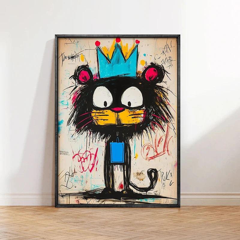 Framed colorful artwork of a cartoon cat with a crown on a white wall.