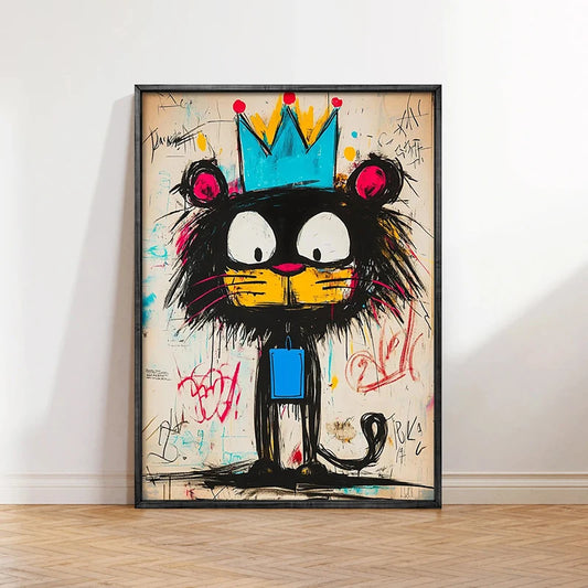 Framed colorful artwork of a cartoon cat with a crown on a white wall. Canvas & Curio