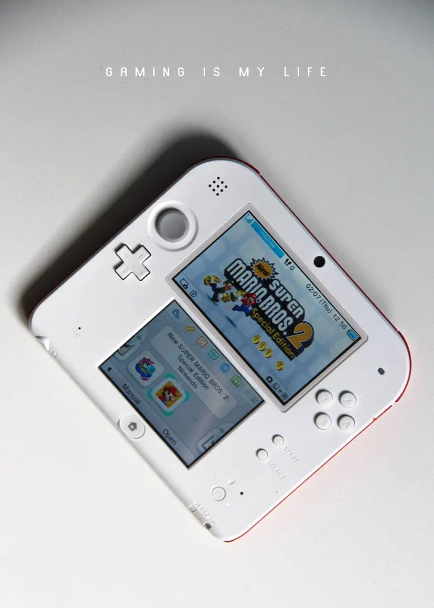 White gaming console with screen displaying a game, text 'Gaming is my life' above.