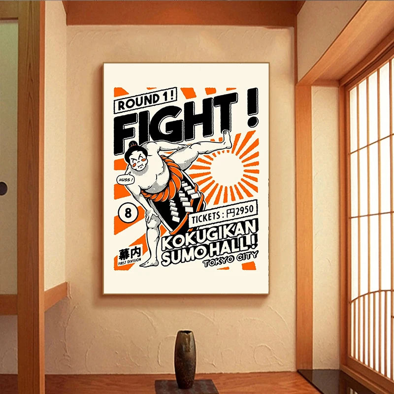 Framed sumo wrestling poster on a wall in a room with wooden flooring and sliding doors.