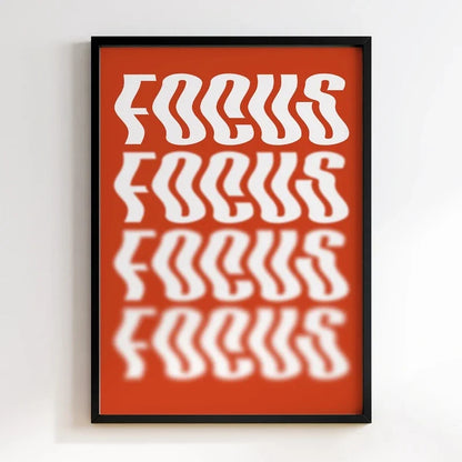 Framed poster with 'FOCUS' text on a red background